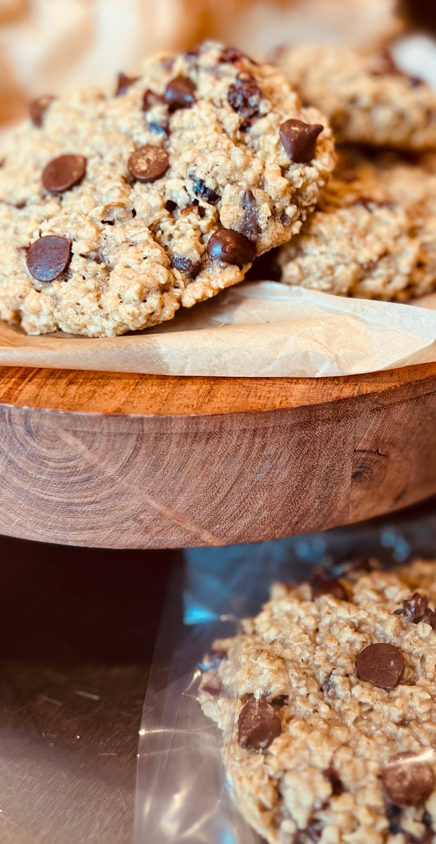 Oatmeal cranberry dark chocolate pecan cookies individually wrapped.  Also displayed on trivet.