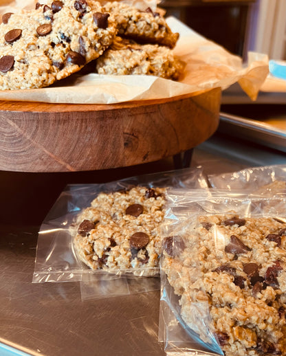 Oatmeal cranberry dark chocolate with pecan cookies individually wrapped.  Also displayed on trivet and cookie sheet.