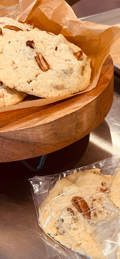 Cream cheese with pecan cookies individually wrapped.  Also displayed on trivet.